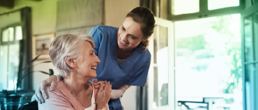 Nurse working with elderly woman